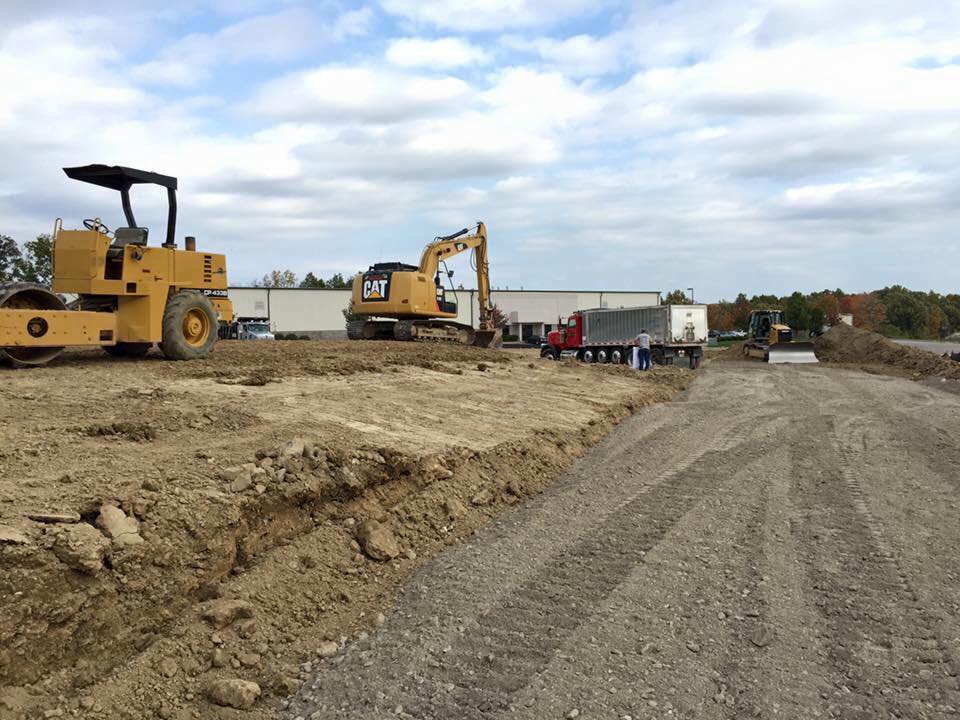 Belsole earthmoving equipment preparing a commercial site